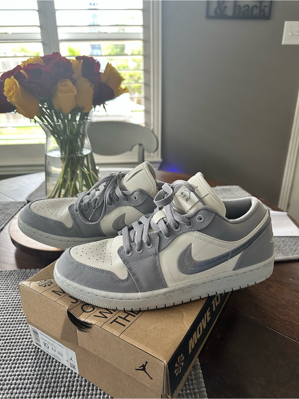 Air Jordan Low-Top Sneakers in Gray and White- women’s